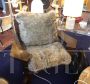 Pair of design armchairs in wood and rope with faux fur cushions