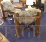 Pair of design armchairs in wood and rope with faux fur cushions