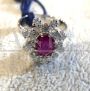 White gold ring with ruby ​​and diamonds