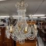 Early 1900s 8-light chandelier in gold metal with crystal drops