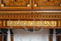 Antique sideboard or bookcase with rich inlays and bronze decorations