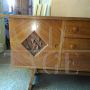 Pair of 1950s sideboards with carvings