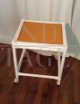 Bamboo and leather coffee table with wheels                            