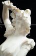 Antique French Napoleon III sculpture in alabaster depicting a woman with flowers