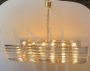 Horizontal chandelier in Murano glass and brass