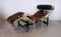 Bauhaus-inspired golden chaise longue in cowhide