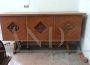 Pair of 1950s sideboards with carvings