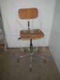 80s stool with beech seat and chromed tube.