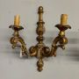 Pair of antique wall lights from the mid-19th century in carved and gilded wood