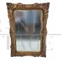 Gilded wooden mirror with floral decorations