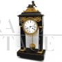 Antique pendulum clock from the Directoire period in gilded bronze and marble