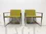 Minimalist design armchairs in metal and green fabric