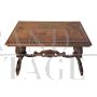 Antique carved desk table with studded leather top       