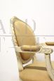 Shabby chic antique style armchair in white wood and beige padding