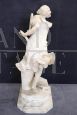 Sculpture of a girl playing tennis in white marble, early decades of the 20th century