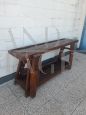 Antique carpenter's bench table from the early 19th century in oak with vice