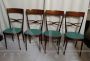 Pair of Melchiorre Bega chairs in green skai leather, 1950s