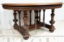 Antique oval extendable table from the French Henry II era