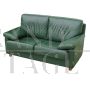 Vintage style sofa in green leather