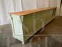 Vintage 1950s shop counter and shelving unit in green paint