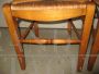 Set of 4 antique style honey walnut chairs with straw seat