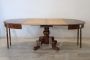 Antique oval extendable dining table in walnut, mid 19th century