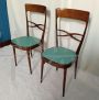 Pair of Melchiorre Bega chairs in green skai leather, 1950s