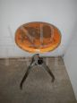 Vintage industrial stool from the 80s with wooden seat