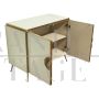 Two-door sideboard in white glass with brass handle