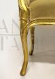 Early 19th century Empire armchair in gilded wood and ocher yellow velvet