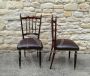 Pair of Chiavarine chairs from the 1960s with gray skai seat