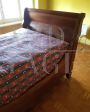 Antique double sleigh bed from the mid-19th century in walnut