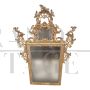 Large Venetian Louis XV style mirror in carved and gilded wood