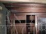 Large 1950s walnut bookcase with leaded glasses