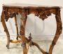 Antique Louis Philippe console table in richly carved walnut