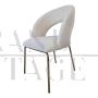 Design chair in white bouclé fabric