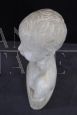 Marble bust sculpture of a child from the early 1900s