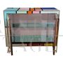 Sideboard in colored glass with illuminated mirror interior