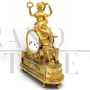 Antique clock from the Directoire period with Psyche in gilded bronze, 18th century France