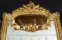 Antique French Napoleon III mirror in gilded and carved wood, 19th century