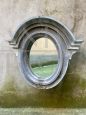 Oval mirror made from an Art Nouveau window