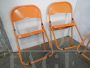 Set of 3 orange metal folding chairs, 1970s