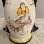 Futuristic 1930s majolica vase with ceramist figure