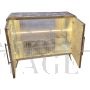 Design sideboard in artistic colored glass with lighting