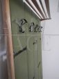 Vintage coat hanger in green leatherette