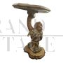 Pair of small antique style consoles carved with cherubs