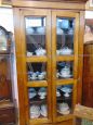 Vintage display cabinet glass cupboard in oak, with beveled glasses