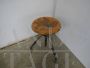 Vintage industrial stool from the 80s with wooden seat