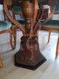 Antique round table inlaid with sculpted leg, early 19th century