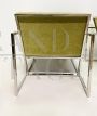 Minimalist design armchairs in metal and green fabric